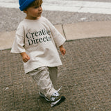 Graphic Tee- Creative Director- Sand
