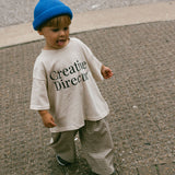 Graphic Tee- Creative Director- Sand